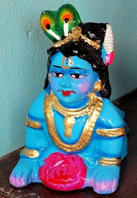 Crawling Krishna doll